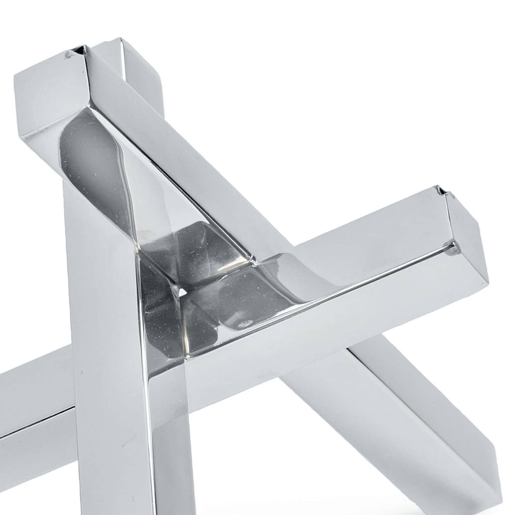Sculpture intersectionnelle en nickel poli